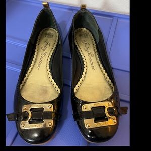 Juicy Couture black ballet flats with gold accent.